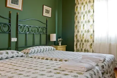 Cama o camas de una habitación en El Milano Real