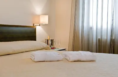 Cama o camas de una habitación en El Milano Real
