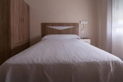 Cama o camas de una habitación en Hotel Tierra