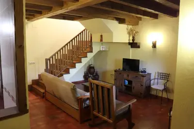 Una televisión o centro de entretenimiento en Complejo Rural Las Palomas