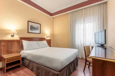 Cama o camas de una habitación en Crisol Regio