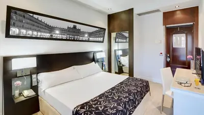 Cama o camas de una habitación en Sercotel Las Torres