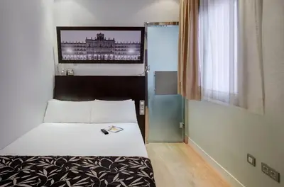 Cama o camas de una habitación en Sercotel Las Torres