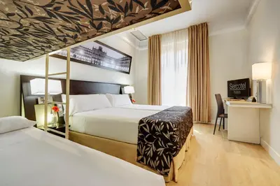 Cama o camas de una habitación en Sercotel Las Torres