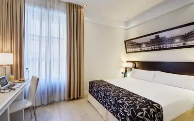 Cama o camas de una habitación en Sercotel Las Torres
