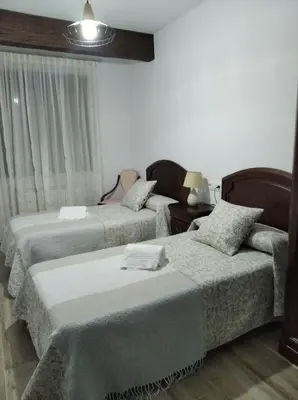 Cama o camas de una habitación en La Teja del Jerte