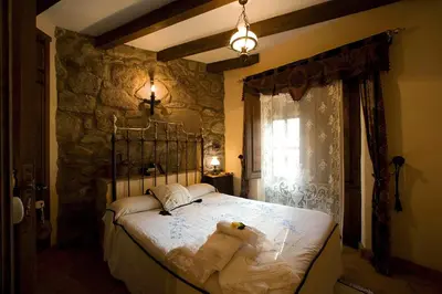 Cama o camas de una habitación en CASA RURAL MARGARITA I