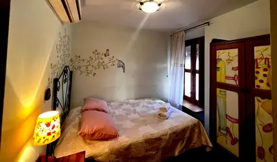 Cama o camas de una habitación en Destino Deluxe Plaza de Santiago - 3 hab