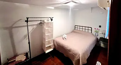Cama o camas de una habitación en Destino Deluxe Plaza de Santiago - 3 hab