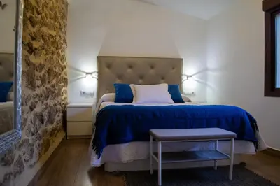 Cama o camas de una habitación en Casa Rural La Recuera
