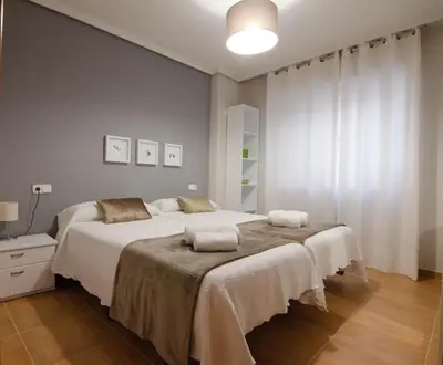 Cama o camas de una habitación en Vut. GALERIA DEL OESTE
