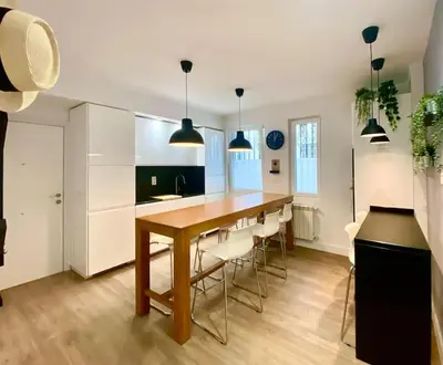 Una cocina o zona de cocina en Moderno piso junto a la Plaza Mayor
