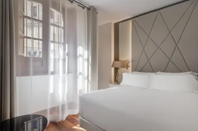 Cama o camas de una habitación en NH Collection Salamanca Palacio de Castellanos