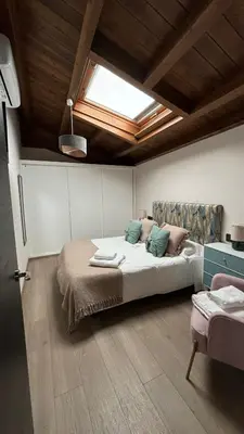 Cama o camas de una habitación en Apartamentos en el Valle del Jerte Flores para Angela