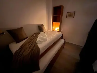 Cama o camas de una habitación en CASA MARUJA