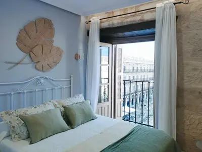 Cama o camas de una habitación en Premium Apartment PLAZA MAYOR