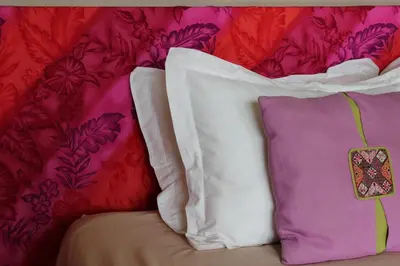 Cama o camas de una habitación en Hotel La Canela