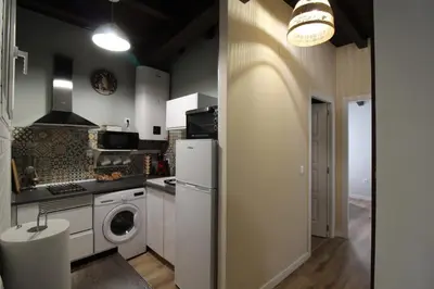 Una cocina o zona de cocina en Apartamentos Vedelejos