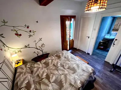 Cama o camas de una habitación en Destino Deluxe Plaza De Santiago- 1 hab