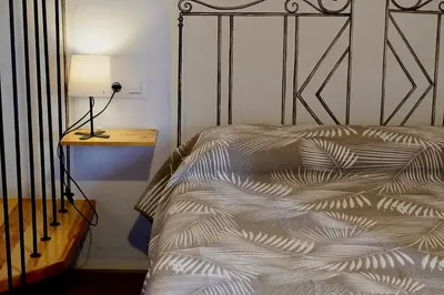 Cama o camas de una habitación en Destino Deluxe Plaza De Santiago- 1 hab