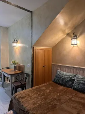 Cama o camas de una habitación en APARTAMENTO ESTUDIO AS ANDURIÑAS