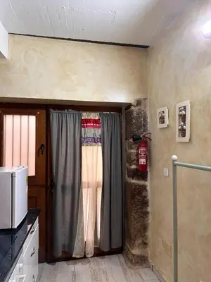 Una cocina o zona de cocina en APARTAMENTO ESTUDIO AS ANDURIÑAS