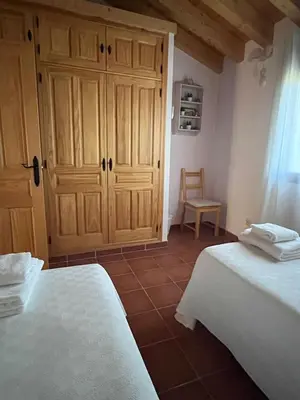 Cama o camas de una habitación en El huerto de Lino