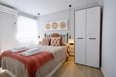 Cama o camas de una habitación en Apartamento De la Haya, junto al Teatro Romano