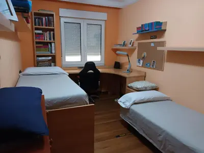 Cama o camas de una habitación en IDEAL FAMILAS