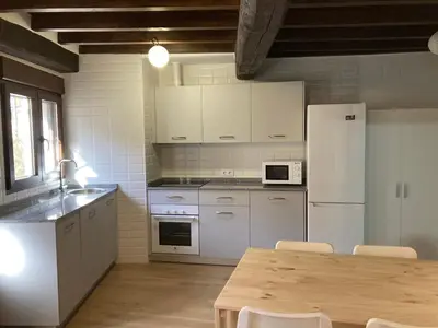 Una cocina o zona de cocina en Monforte de la Sierra - Acogedora y cálida vivienda