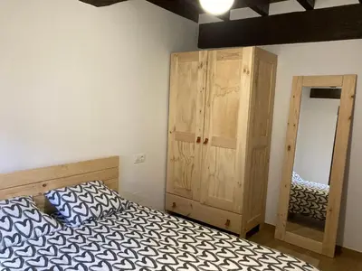 Cama o camas de una habitación en Monforte de la Sierra - Acogedora y cálida vivienda