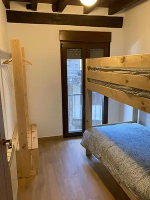 Cama o camas de una habitación en Monforte de la Sierra - Acogedora y cálida vivienda