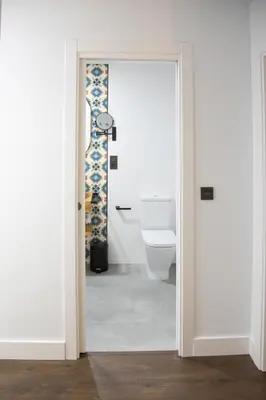 Un baño de Apartamentos Boutique Cervantes