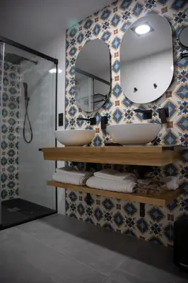 Un baño de Apartamentos Boutique Cervantes