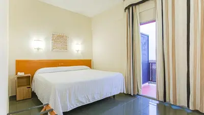 Cama o camas de una habitación en Hotel Zeus