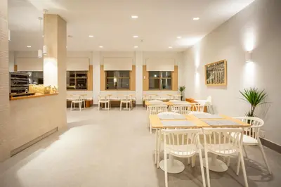 Un restaurante o sitio para comer en Hotel Zeus