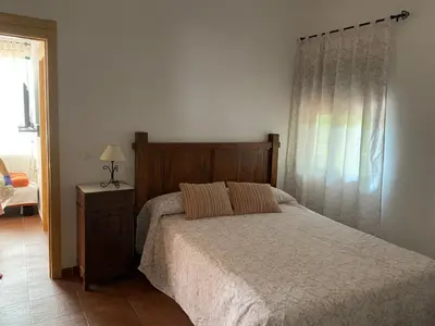 Cama o camas de una habitación en Apartamentos en sierra de gata ALMA