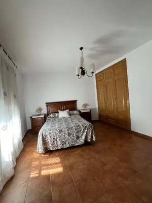 Cama o camas de una habitación en Apartamentos en sierra de gata ALMA