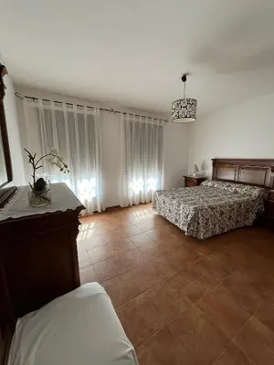 Cama o camas de una habitación en Apartamentos en sierra de gata ALMA