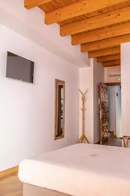Una televisión o centro de entretenimiento en ANJ Alojamientos