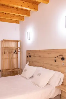 Cama o camas de una habitación en ANJ Alojamientos