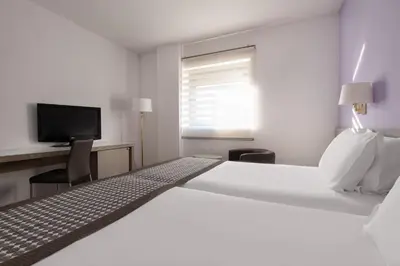 Cama o camas de una habitación en Exe Salamanca