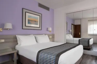 Cama o camas de una habitación en Exe Salamanca