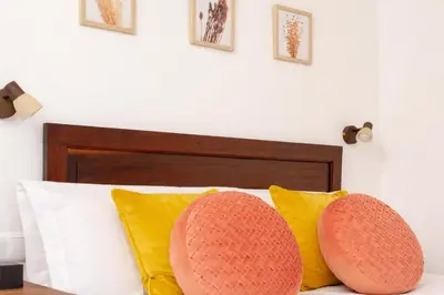 Cama o camas de una habitación en Apartamentos Turísticos Lobelia Suites