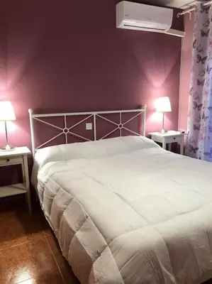 Cama o camas de una habitación en CHEZ GREDOS