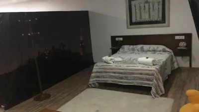 Cama o camas de una habitación en Apartamentos EL SOHO INDUSTRIAL