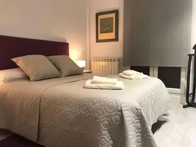 Cama o camas de una habitación en Albatros (wifi y garaje)