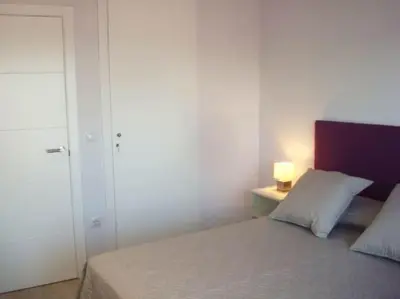 Cama o camas de una habitación en Albatros (wifi y garaje)