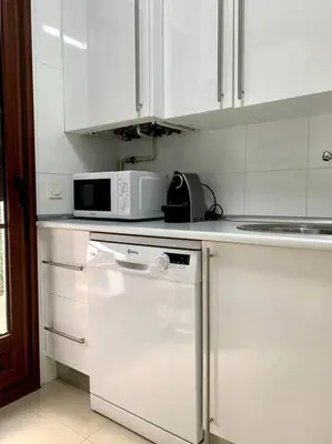 Una cocina o zona de cocina en Lotus (garaje y wifi)