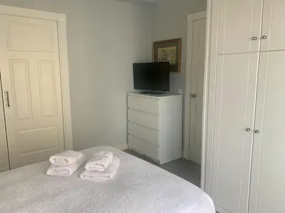 Cama o camas de una habitación en TIGER wifi y garaje